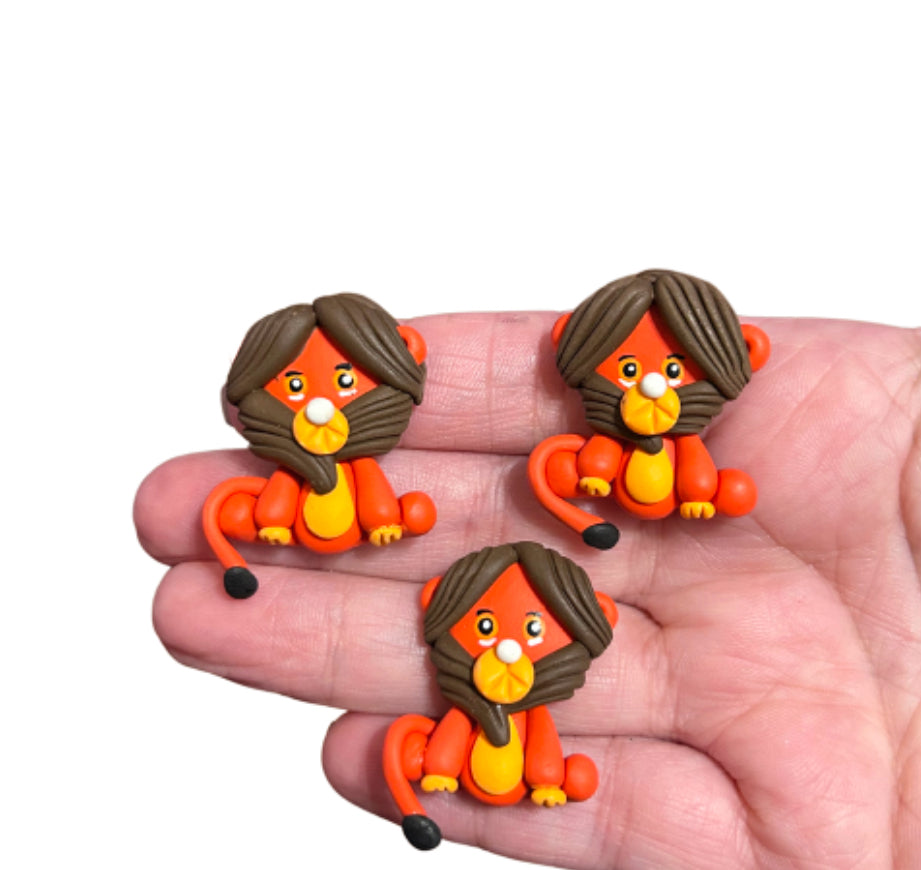 Mischievous Monkey handcrafted clay embellishment