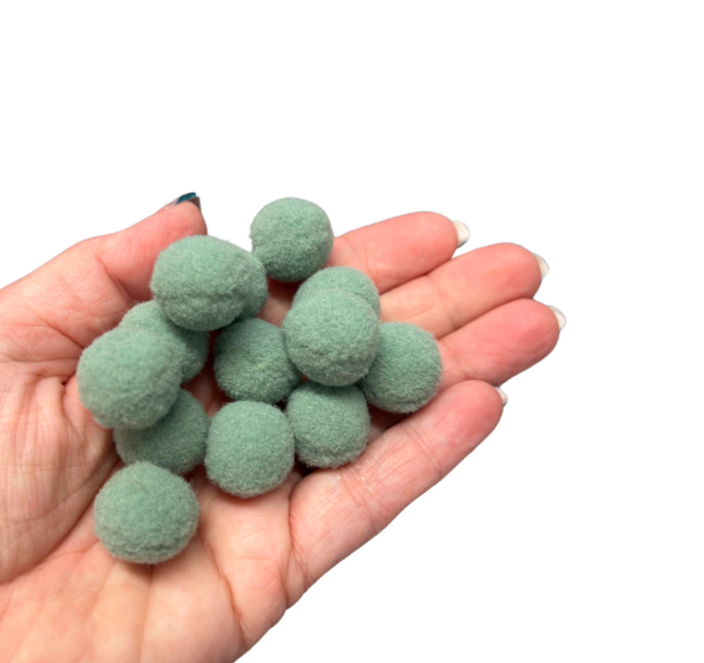 Soft sage coloured Pom poms 20 mm x 10