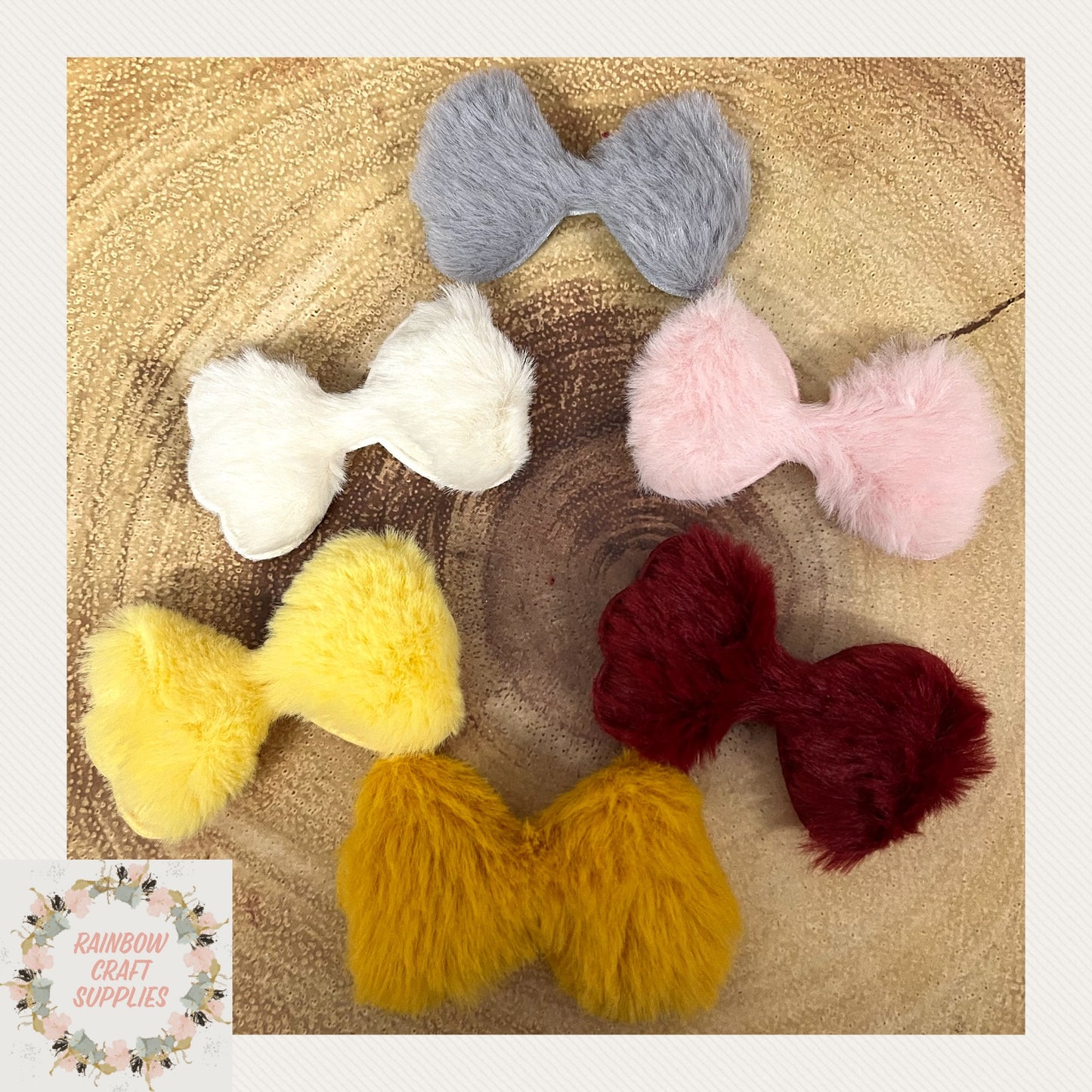 6 x Random mixed Faux fur bows 6 cm x 4cm ( padded backing )