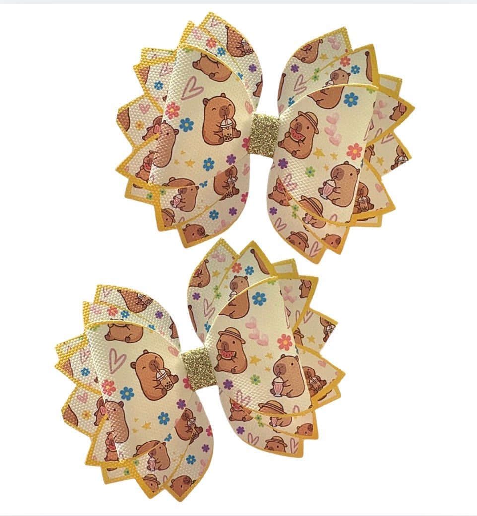 4 x printed in house Leatherette cut around bow loops and Fan Tails 3.5” Capybara