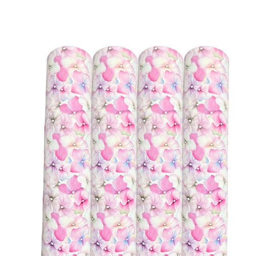 Beautiful pastel sweet pea patterned leatherette fabric