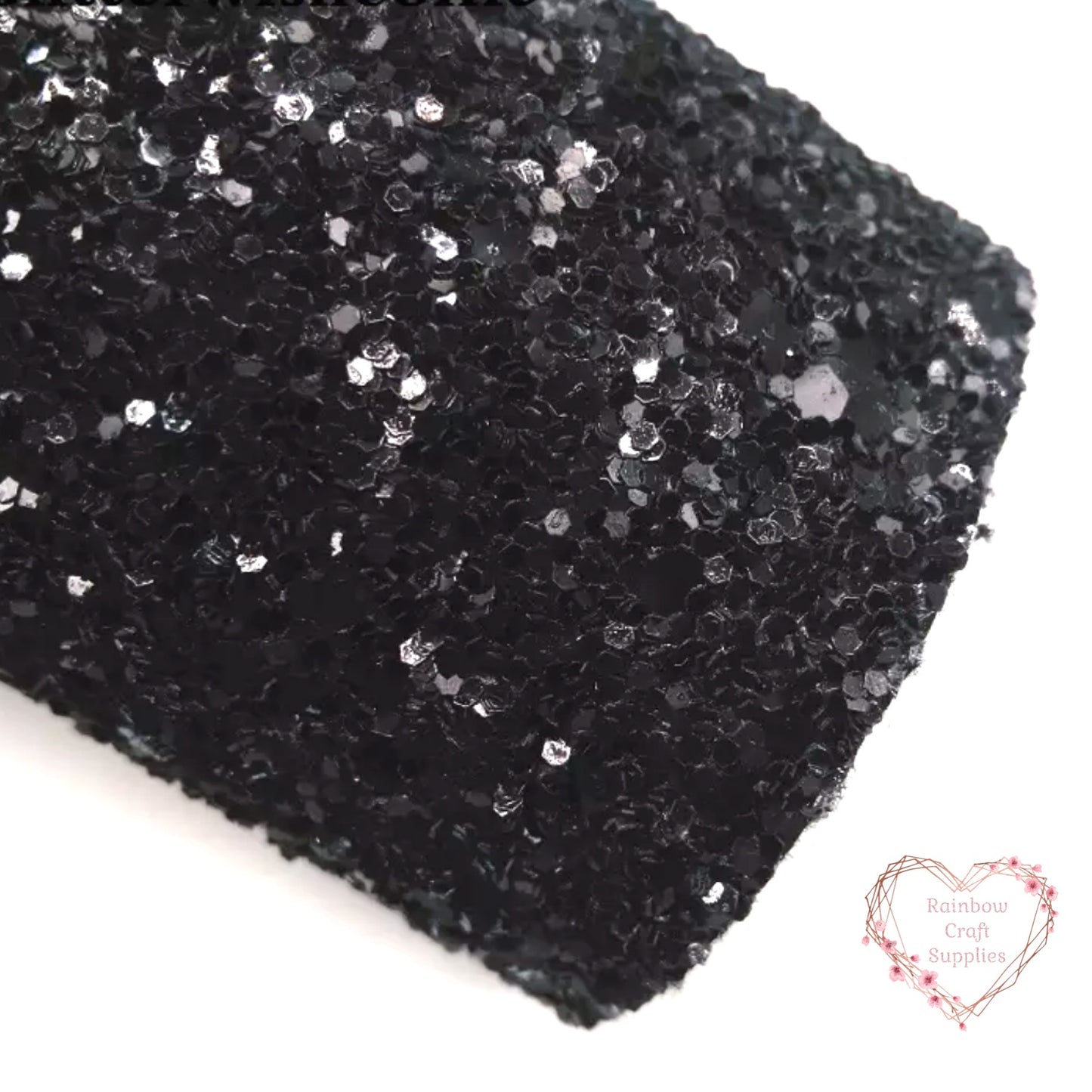 Chunky black glitter fabric