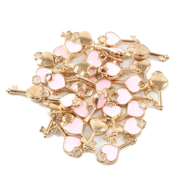 Baby pink. key to your heart charm